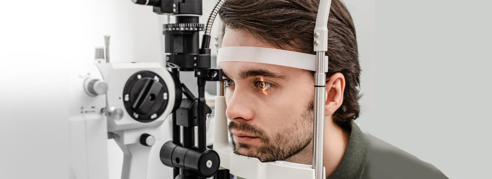 young man during eye exam in Henderson